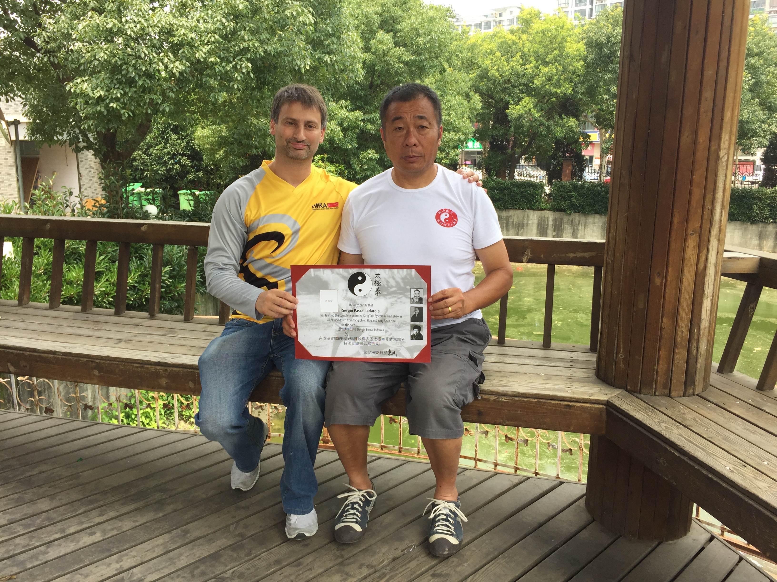 Receiving the certificate of having finished the unarmed curriculum of the Yang Shao Hou and Tian Zhaolin lineage