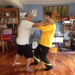 With Sifu Wee Kee Jin practicing the Huang Two Men Sets